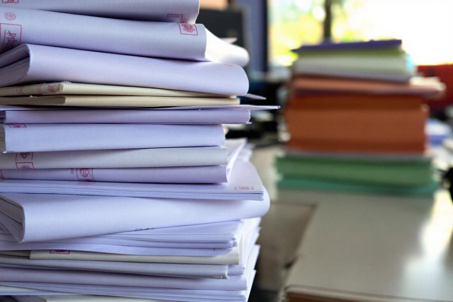 How do social compliance and employee security procedures raise the cost of business registration in Cambodia?